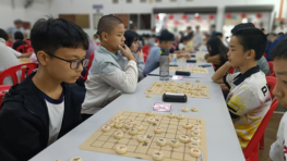 Young Xiangqi players competing at a tournament in June 2026