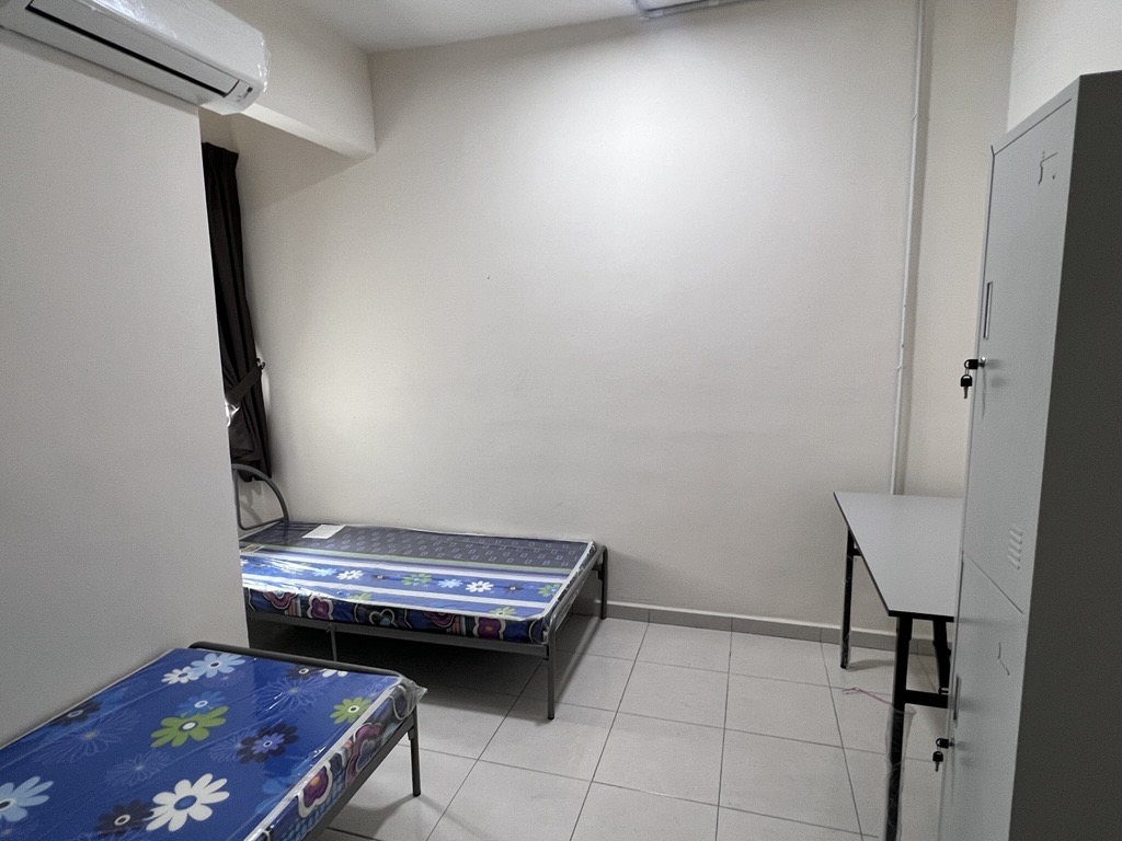 Mahsuri Square male hostel — Shared bedroom with single beds, lockers and a study desk