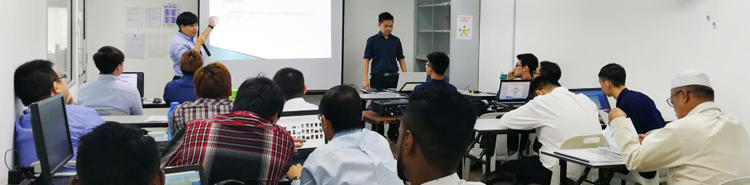 Instructor presenting to participants during a training session at ITPA Penang