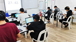 ITPA students taking part in a computer typing challenge