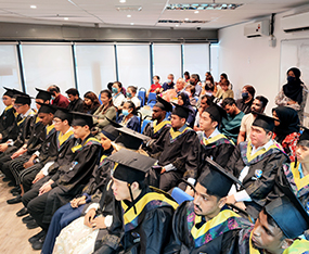 ITPA graduates posing for a ceremony photograph
