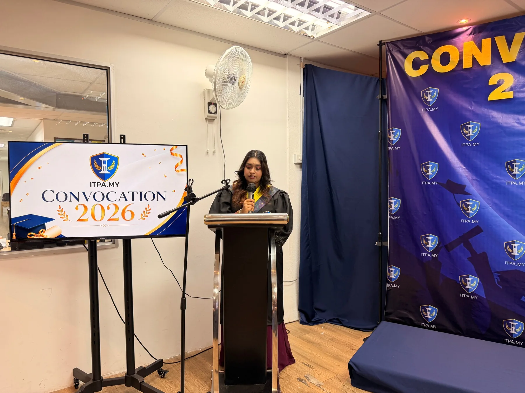 Graduate delivering a speech during ITPA Convocation 2026