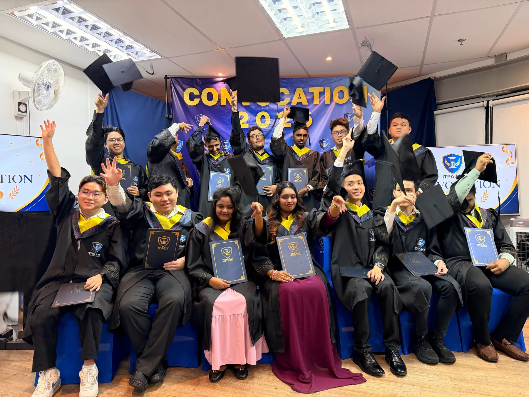 ITPA graduates celebrating together at the 2026 convocation