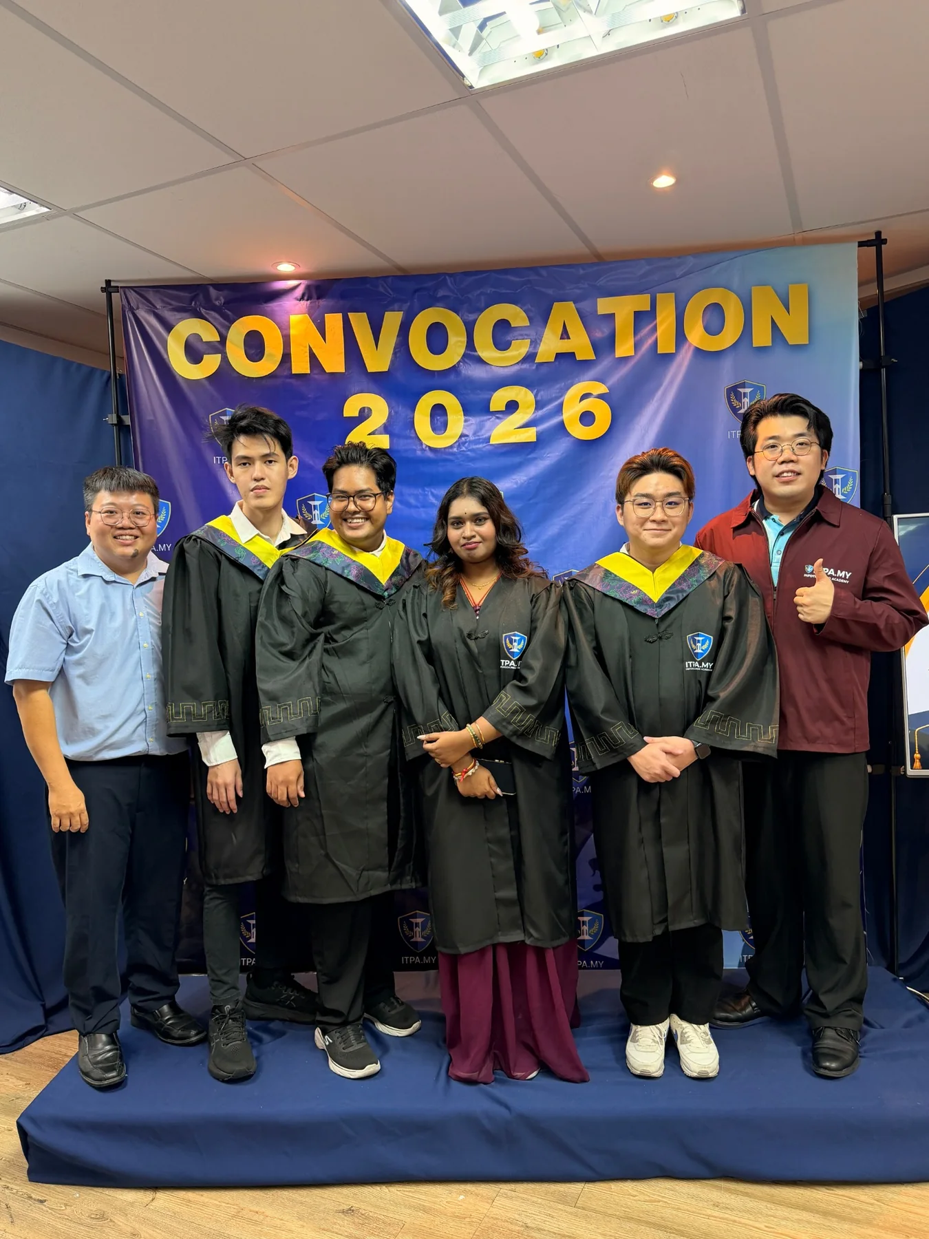 Graduates with the ITPA team at Convocation 2026